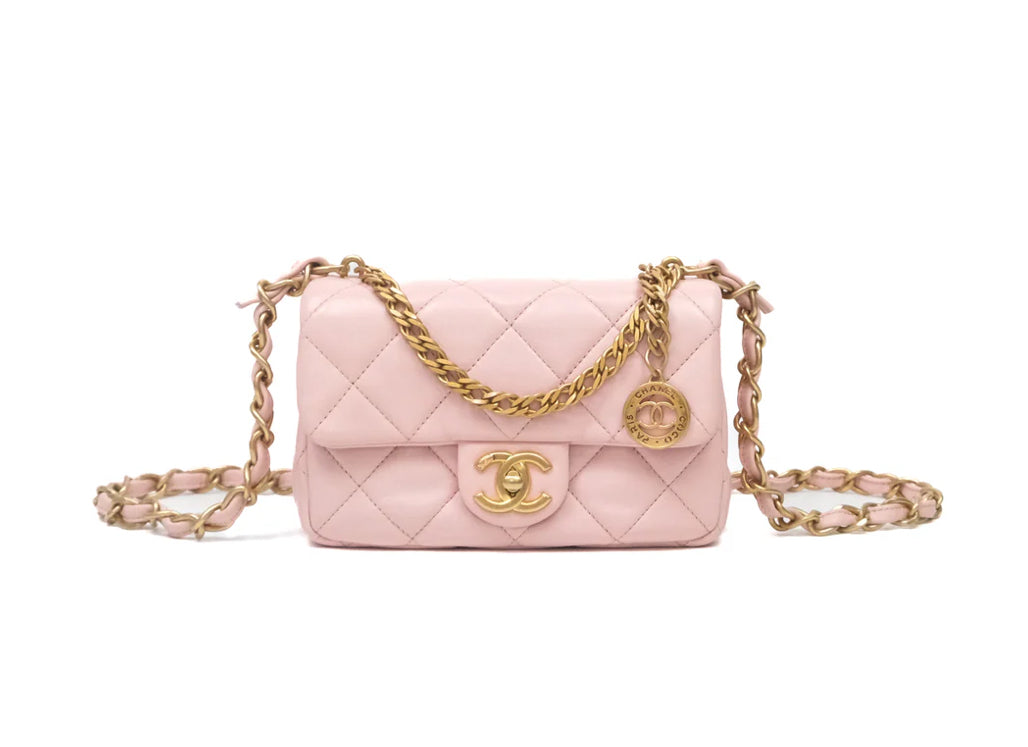 Chanel Pink Lambskin Flap Bag With Distinctive Coin Chain Gold Hardware